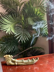 Incense holder and burning incense
